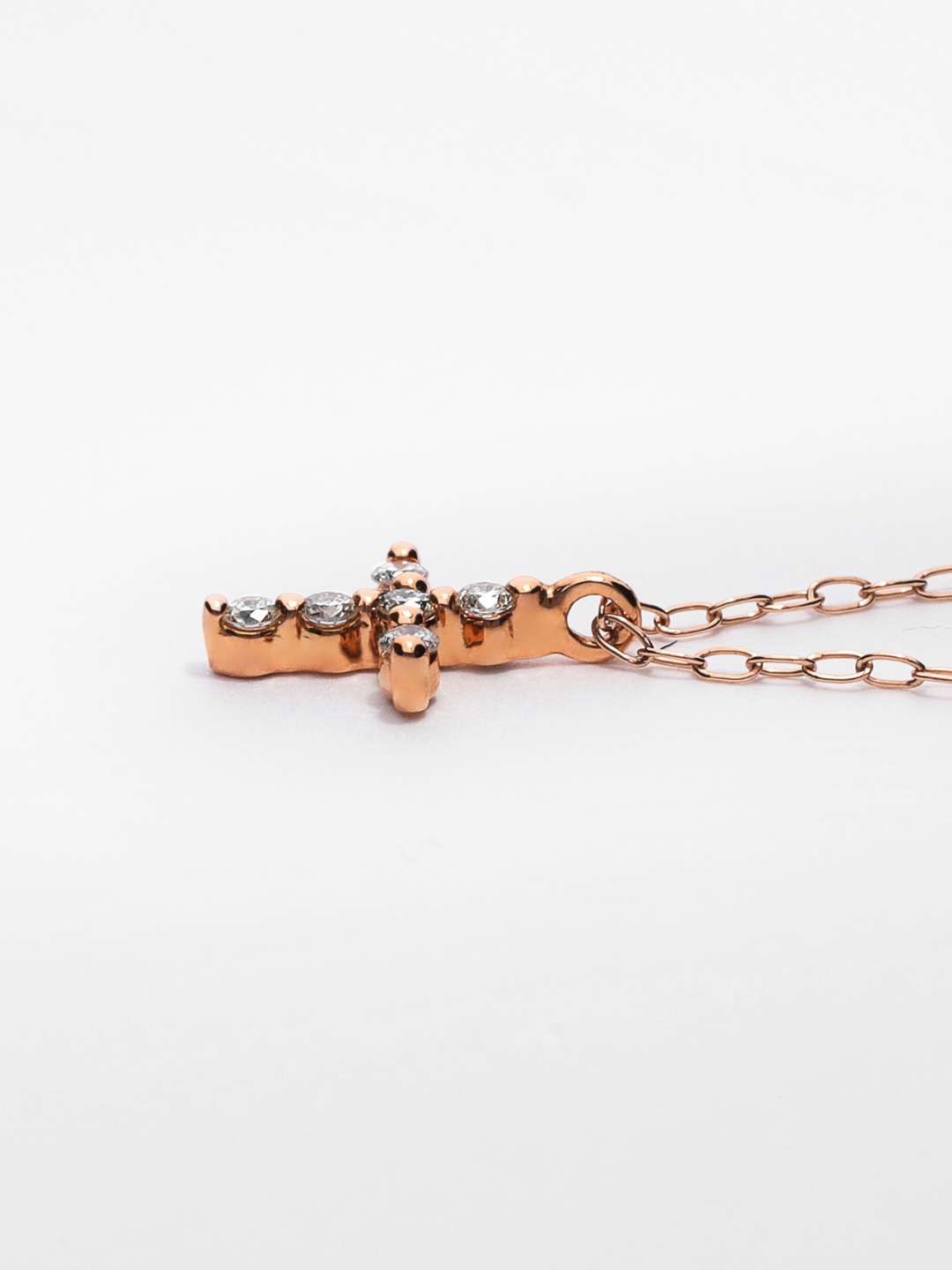 K18・ダイヤモンドプチクロスペンダント